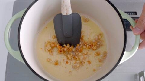 Crisping chicken skins in a Dutch oven.