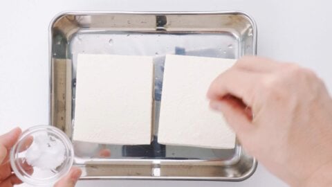 Salt tofu before pressing it.