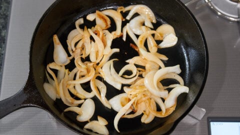 Caramelized onions for avocado and camembert frittata.