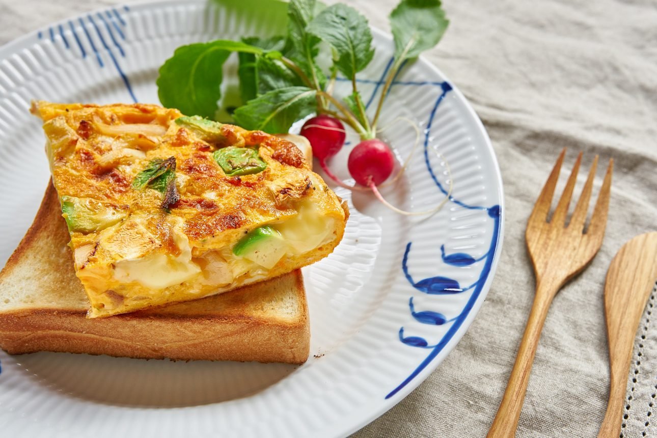 Creamy and ultra flavorful, this caramelized onion, avocado and camembert frittata is crazy good.