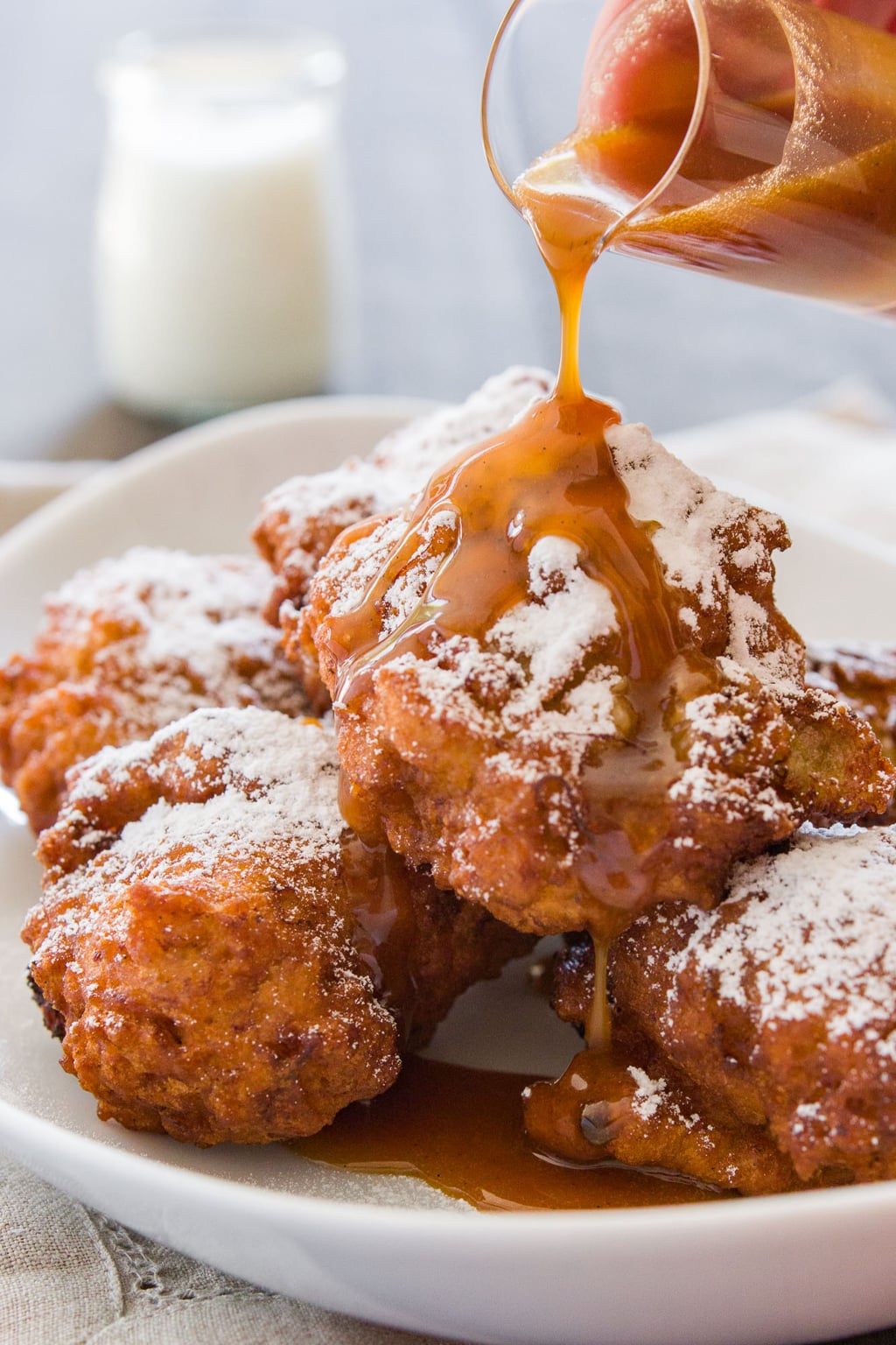 These banana fritters drizzled with vanilla caramel sauce are simply irressistable.