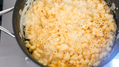 Residual heat gently melts the cheese into the cooked macaroni saving time and ensuring a satiny smooth sauce.