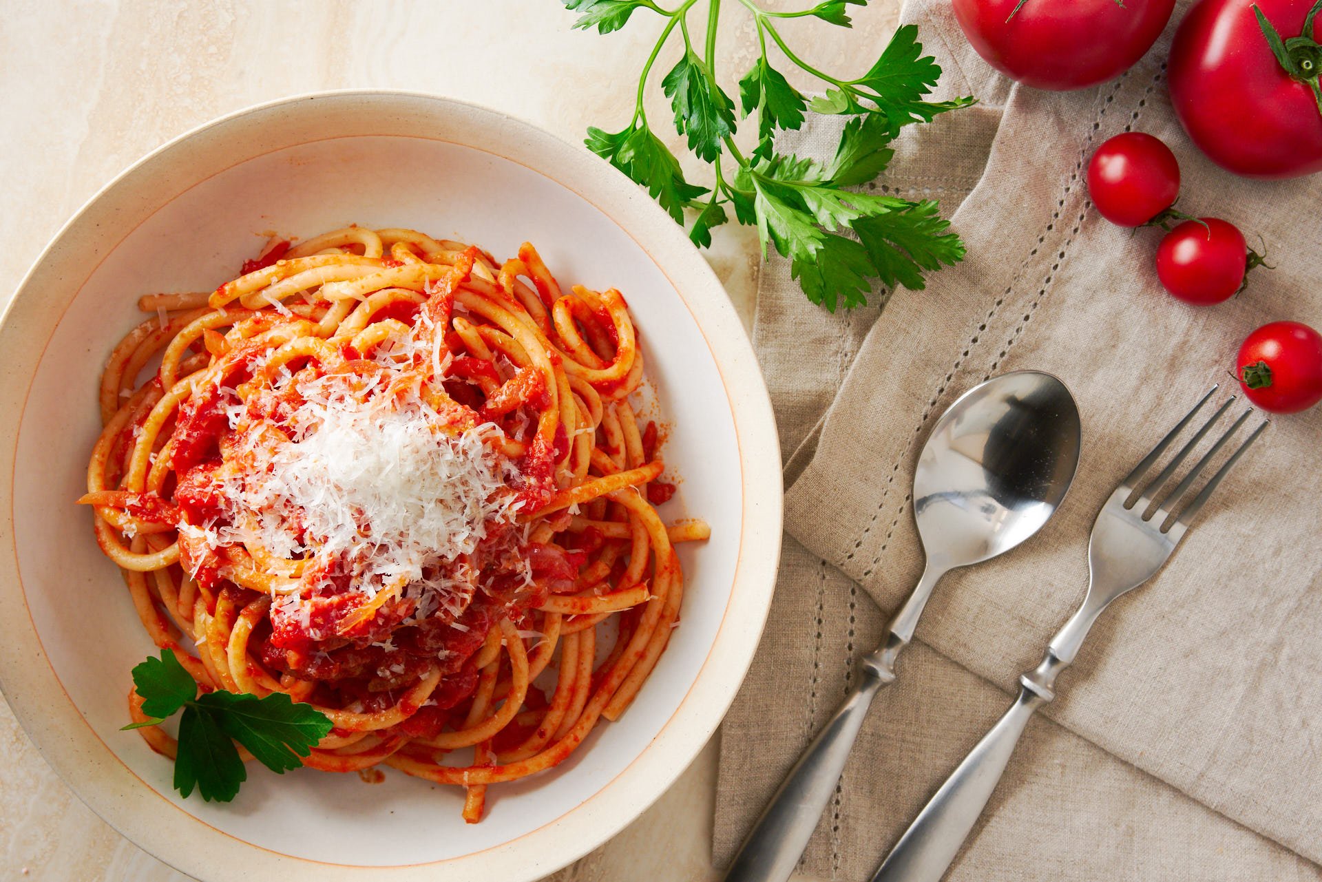 With Guanciale and Pecorino Romano cooked in tomato sauce, Bucatini all'Amatriciana is a mouthwatering pasta that comes together in a matter of minutes.