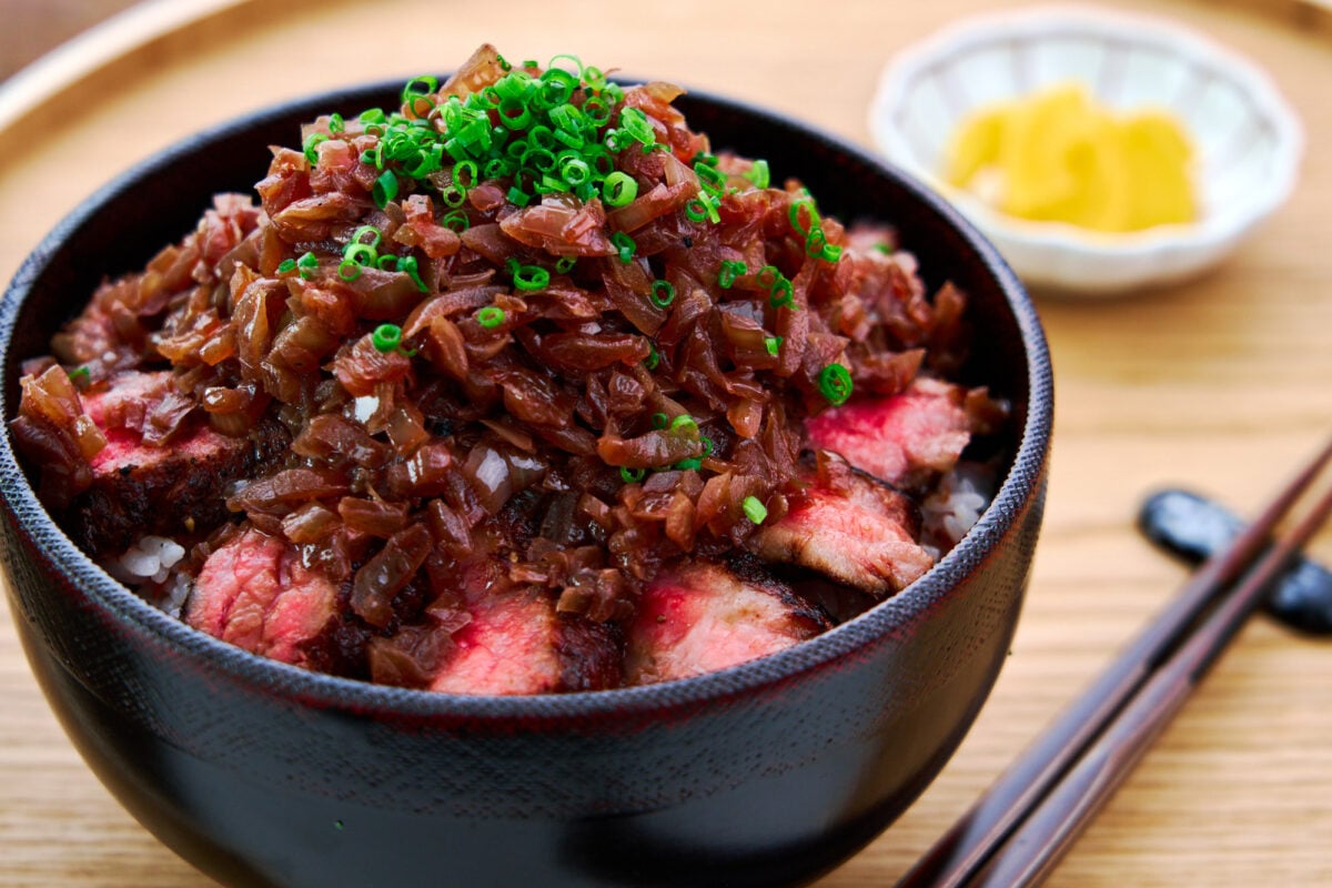 In Chaliapin Steak, onions are used to tenderize beef before it's grilled and topped with onions sauteed with red wine.