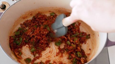 Paprika, onions and peppers being sautéed for Chicken Paprikash