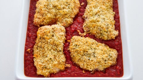 Set the Parmesan Chicken cutlets in the sauce.