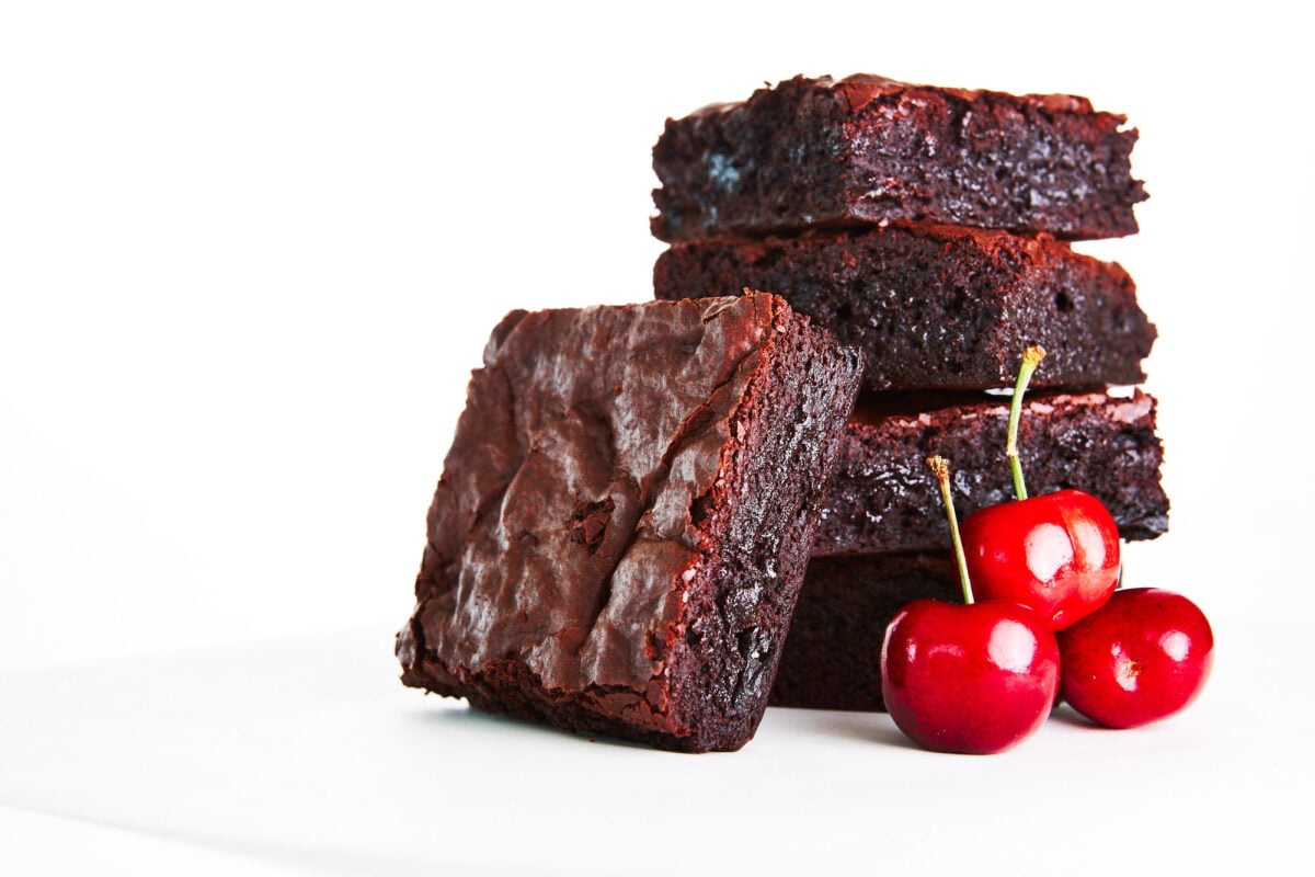 With a rich fudgy center and a crispy cakey top, this is the best chocolate cherry brownie recipe ever.