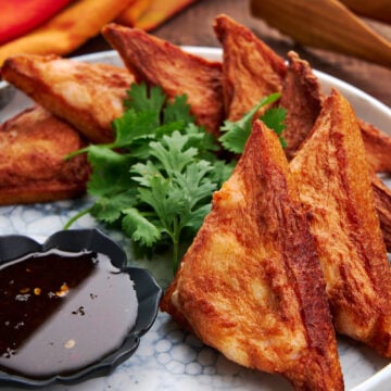 Plump juicy pieces of shrimp bound to crispy toast triangles with soft and flavorful shrimp paste.