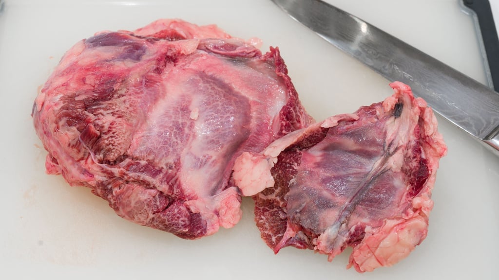 Meat with lots of connective tissue like this beef cheek work best for Goulash