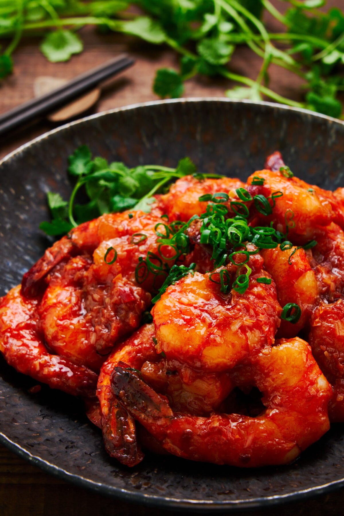 Plump, springy shrimp glazed in a sweet and spicy chili sauce is a modern Japanese-style Chinese classic known as Ebi Chili in Japan.