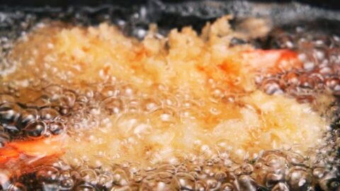 Frying Panko Shrimp in oil.