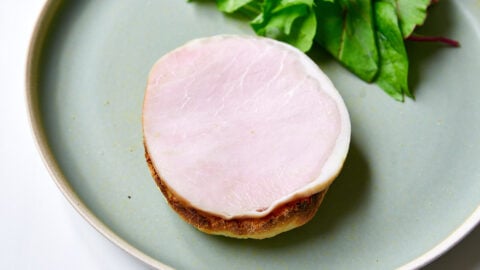 The next component of Eggs Benedict is a thick-cut slice of ham.