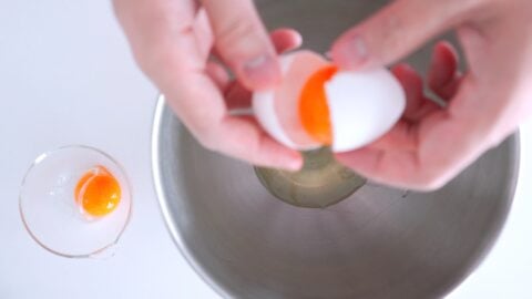 Separating egg yolks from whites to make Swiss Meringue