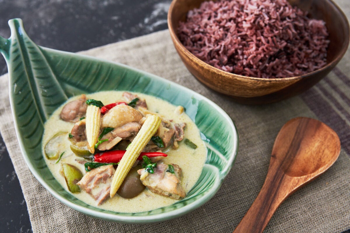 Green chilies and herbs lend a soft green hue to this fragrant thai green curry with chicken, baby corn, and eggplant.