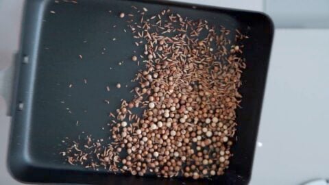 Toasting coriander, cumin and white pepper.