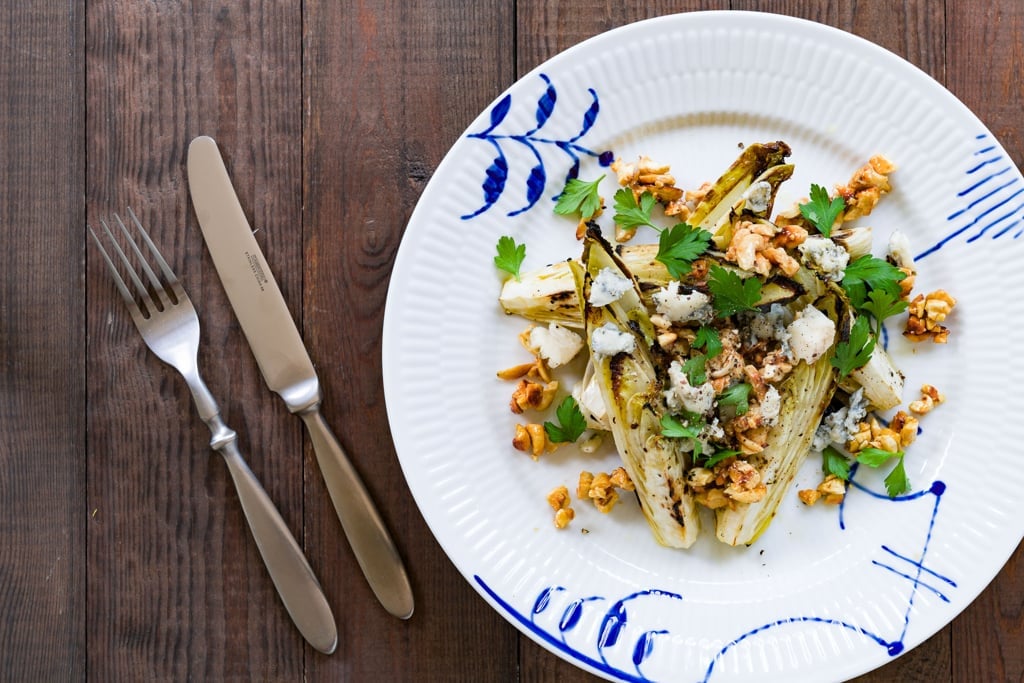 Marinated and grilled endive wedges with gorgonzola and honey roasted cashews.