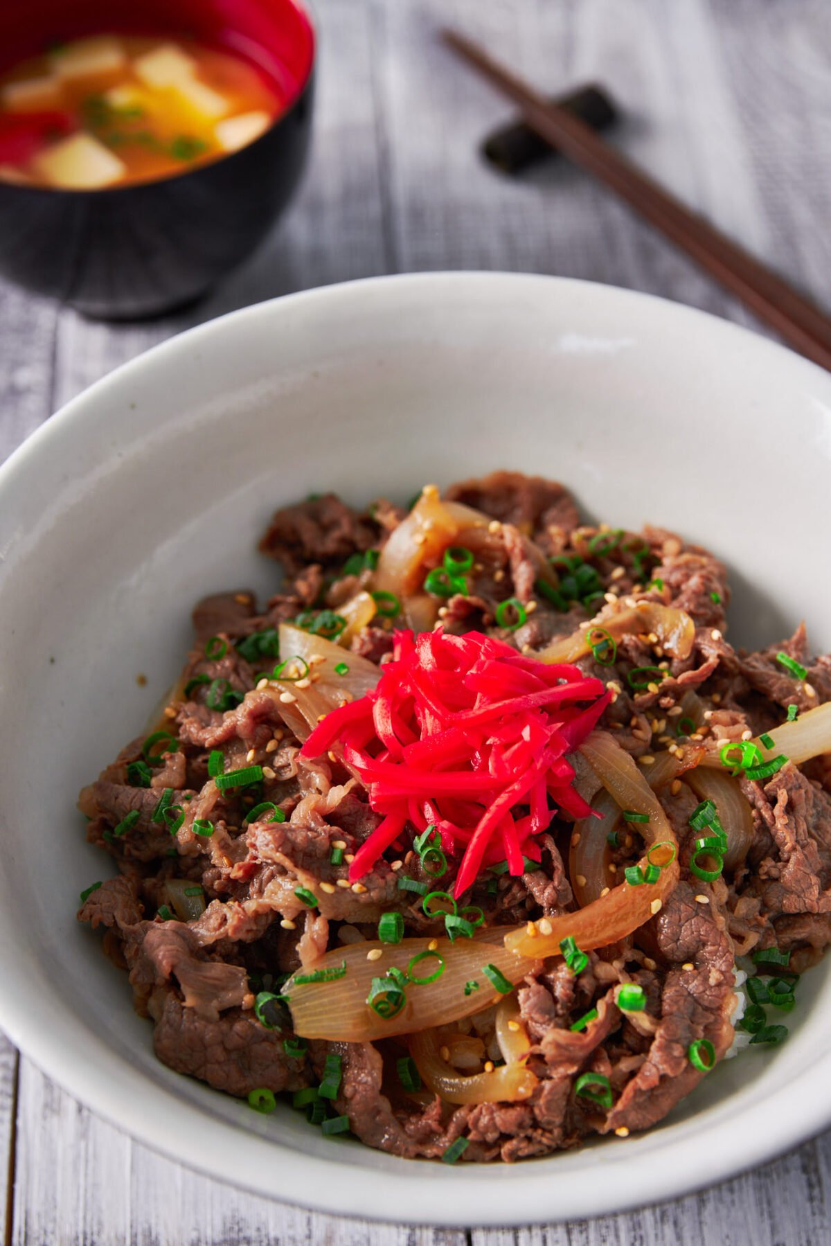 Gyudon (Beef and Bowl), is a classic Japanese dish made with beef and onions that have been simmered in a sweet and savory broth. Served over rice, this easy, satisfying meal comes together in under 15 minutes.