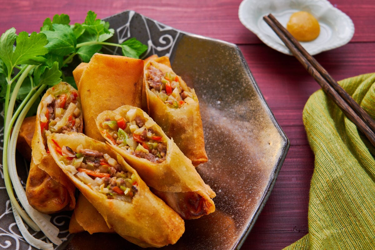 Japanese-style spring rolls, or harumaki, are filled with meat, veggies, mushrooms, and a savory sauce.