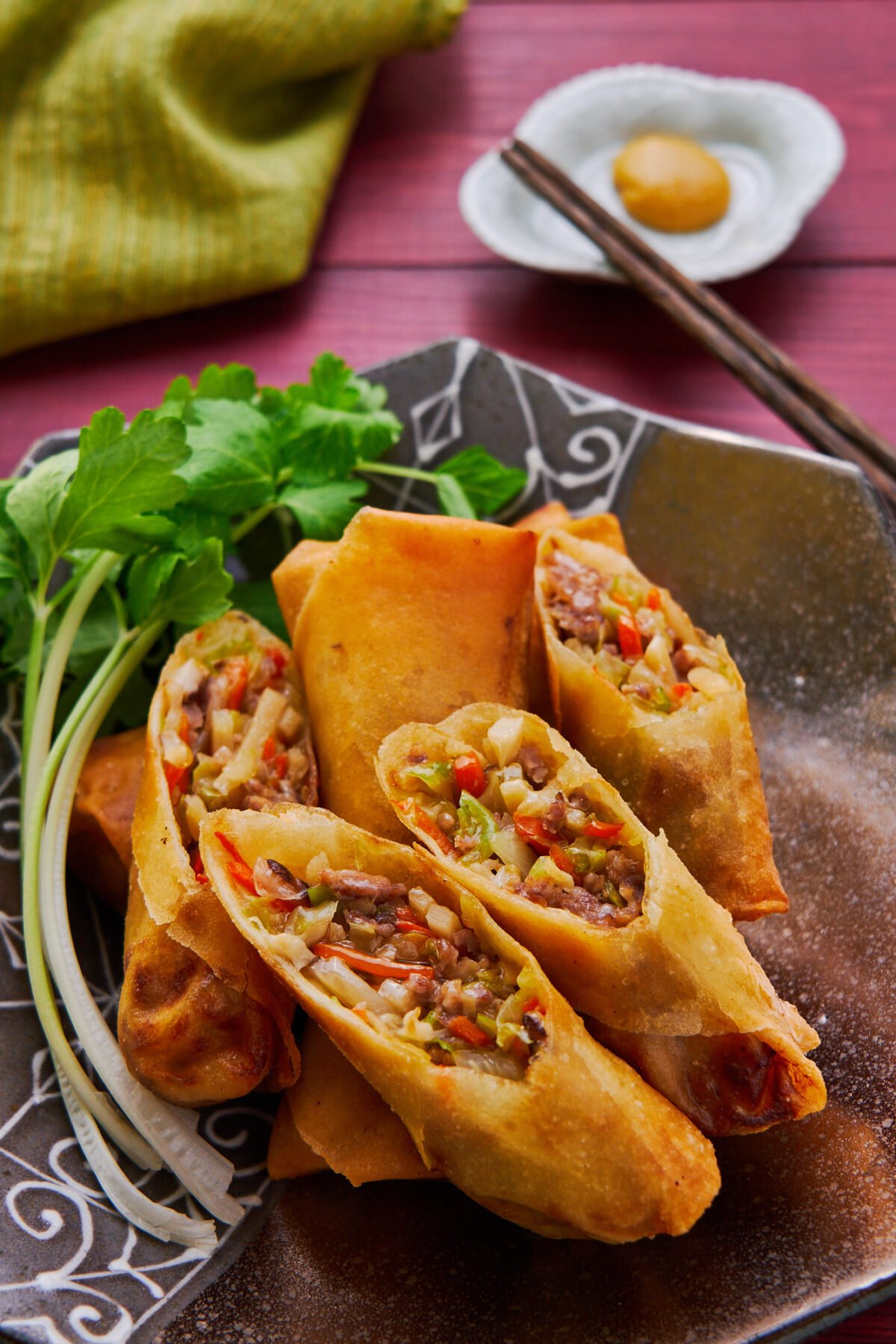 Shatteringly crisp on the outside and loaded with vegetables, mushrooms, and pork in a savory gravy on the inside, this self-saucing Japanese-style spring roll is mouthwateringly good!