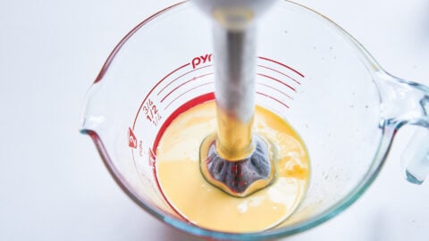 Emulsify the melted butter with egg yolks and some xantham gum to stabilize the Hollandaise Sauce.