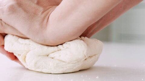 Kneading udon dough by hand.