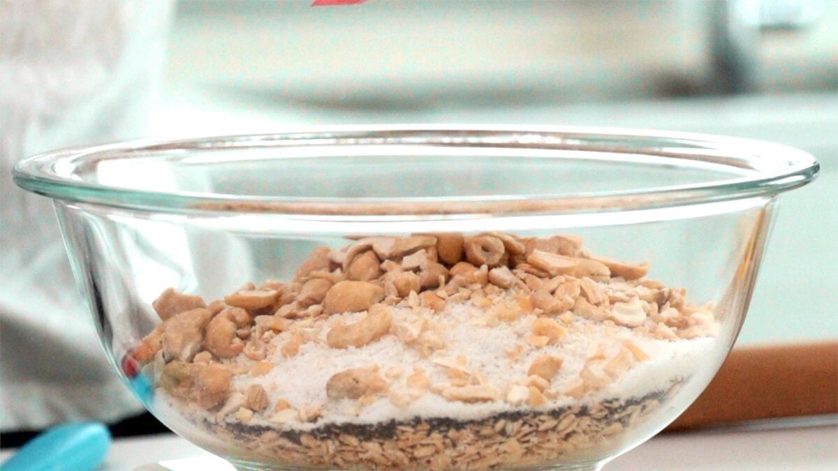 Granola ingredients in a glass bowl.