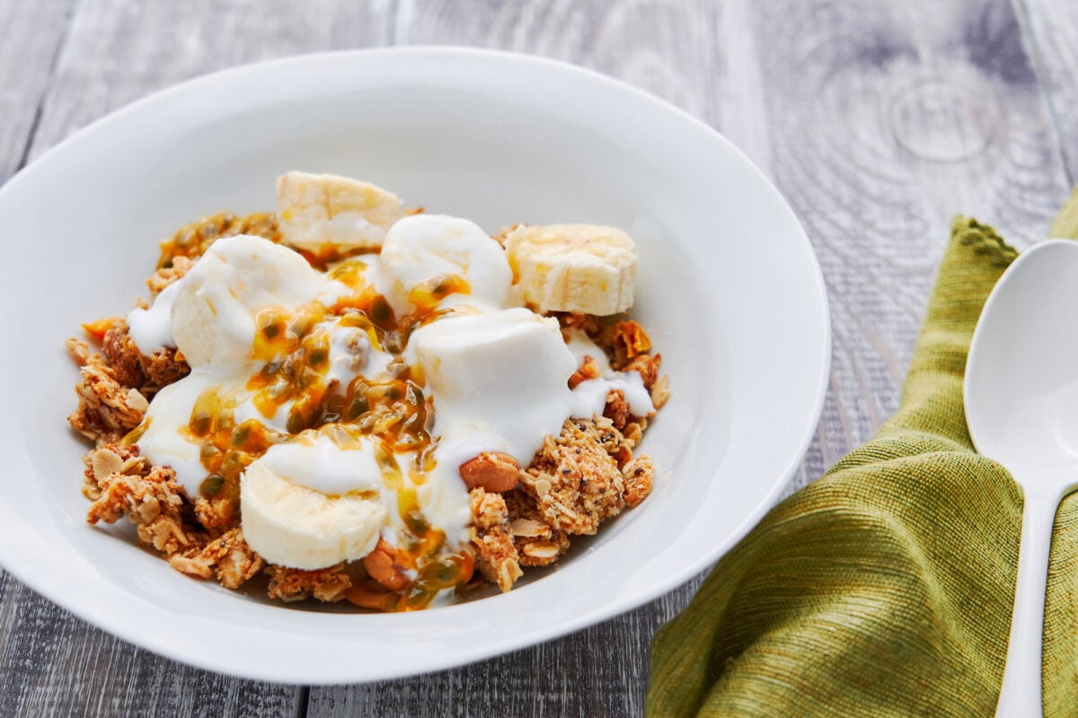 Tropical Coconut Mango Granola with yogurt and bananas.