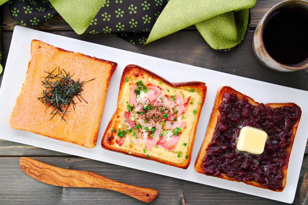 Japanese breakfast toasts lined up (from left to right): Mentai Mayo Toast, Bacon and Egg Toast, Ogura Toast.