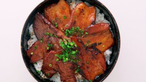 Grilled Japanese Pork Belly on a bowl of rice.