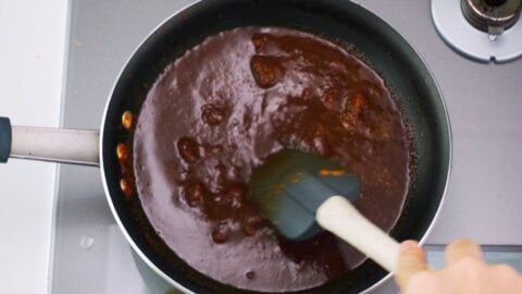 Soup mixture added to caramelized aromatics to make Japanese curry.