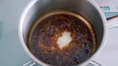 Garlic and onion grated into sauce for the Katsu Sando