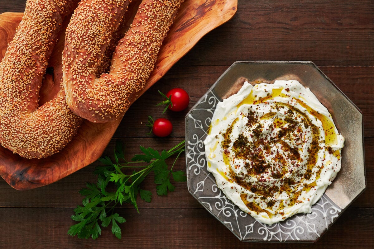 Jerusalem bagels and Labneh garnished with olive oil, sumac and za'atar.