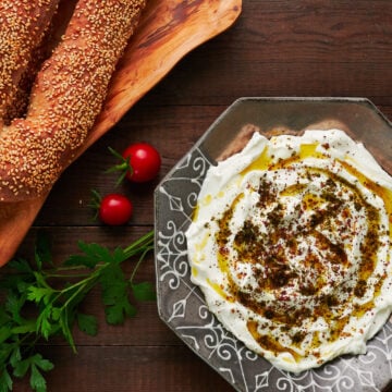 Jerusalem bagels and Labneh garnished with olive oil, sumac and za'atar.