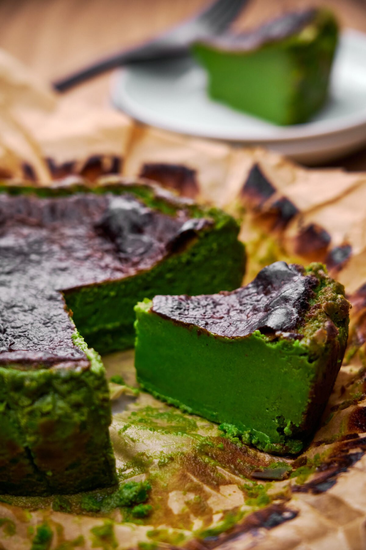 This Matcha Basque Cheesecake is as easy as blending the ingredients and baking them. Silky smooth inside and caramelized on the outside, the matcha powder gives it a vibrant green hue and green tea flavor.