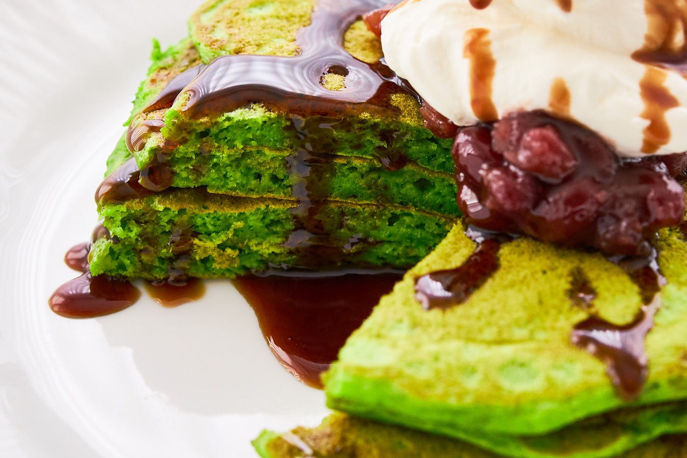 These matcha pancakes are light and fluffy and taste amazing drizzled with kuromitsu syrup.