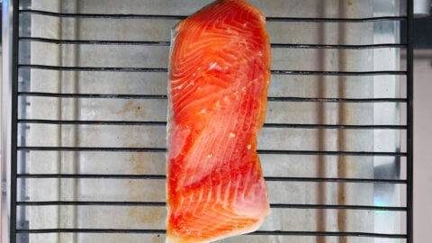 Japanese Miso Salmon on a broiler rack ready to cook.