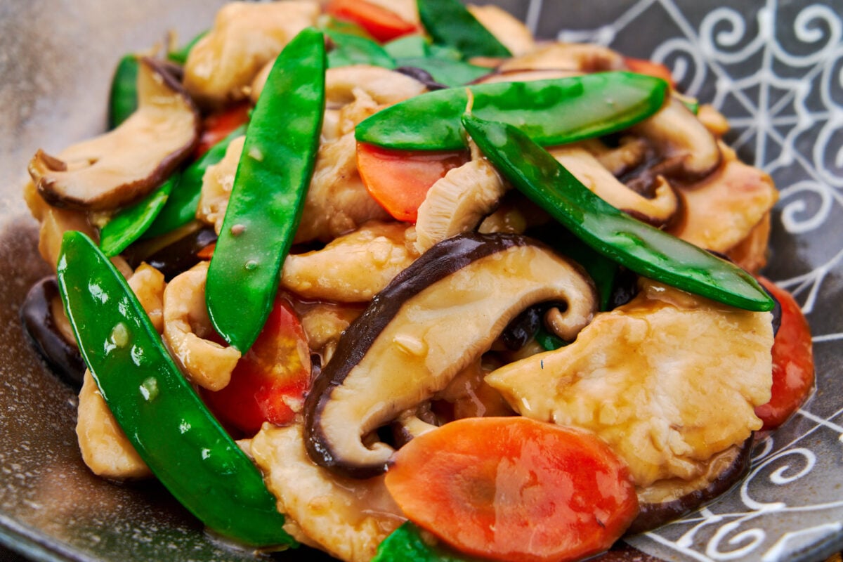 Chicken, mushrooms, carrots and sugar peas stir-fried with garlic and oyster sauce.