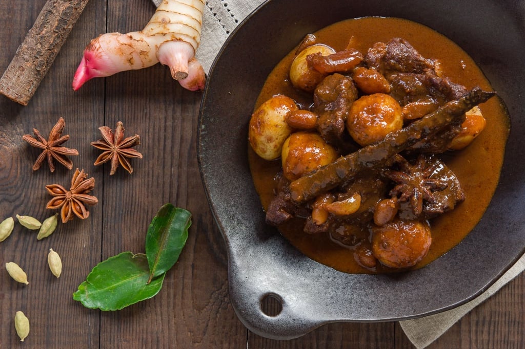 Savory, spicy, sweet and tangy Massaman curry is a Thai dish with Persian roots. With tender chunks of beef, potatoes and peanuts, this curry is both flavorful and aromatic.