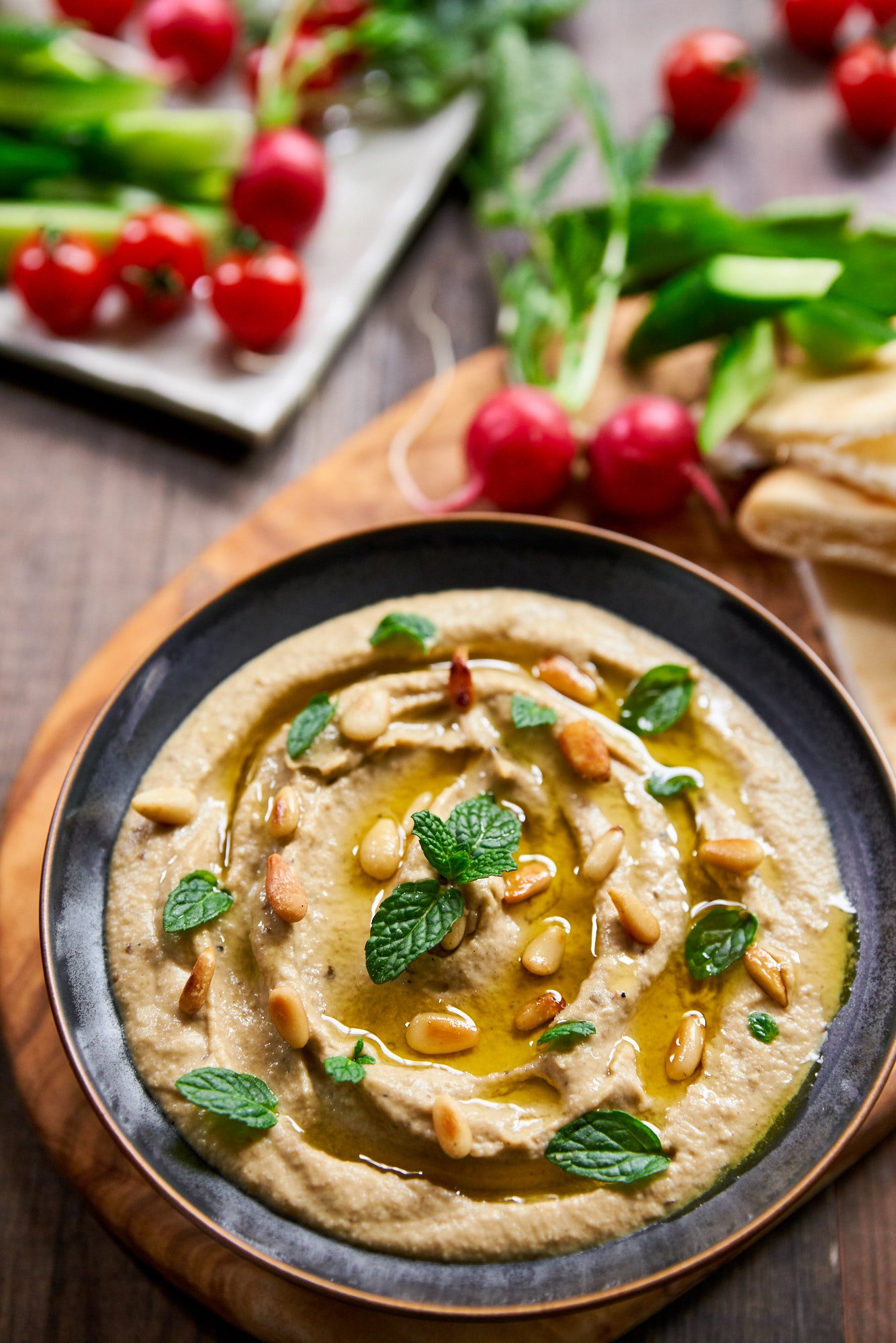 Mutabbal is a delicious Levantine condiment that's creamy, smoky, and tangy. This easy 5 ingredient dip recipe is the perfect party idea.