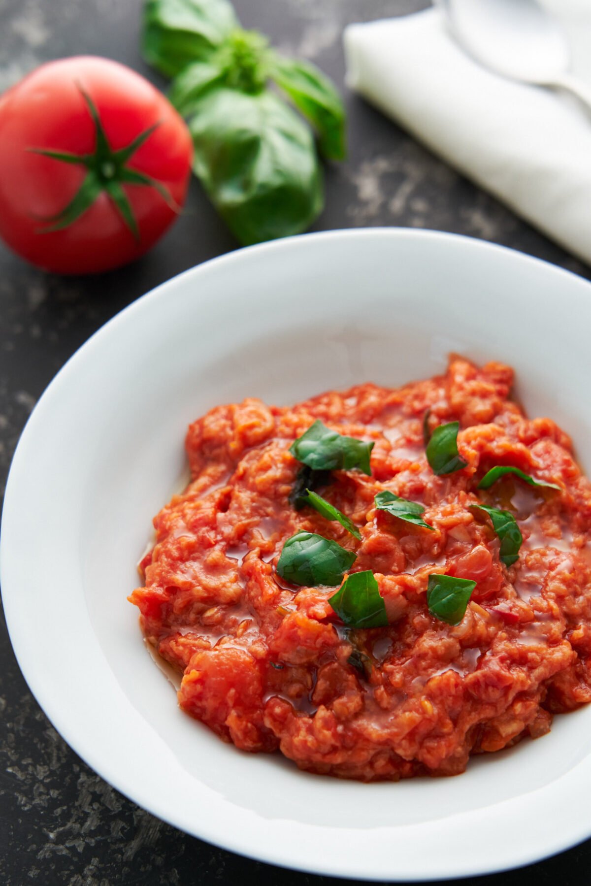 A mouthwatering tomato soup thickened with crusty bread, this Pappa al Pomodoro recipe is for everyone who loves dipping their bread into their soup.