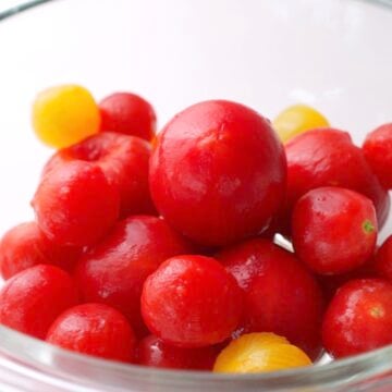 Bowl of peeled tomatoes.