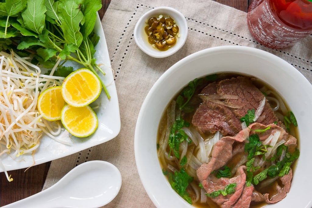 Recipe for making the best Pho. With tender brisket, rare steak in an fragrant oxtail broth.