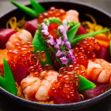 How to make Chirashi Sushi with tuna, shrimp, egg, carrots and snap peas.