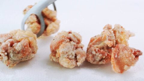 Draining karaage on paper towels.