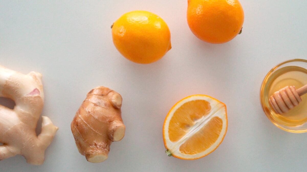 Ingredients for Ginger Tea including ginger,  Meyer Lemons, and honey.