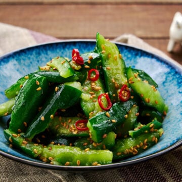 Crunchy smashed cucumbers dressed with a nutty and spicy sesame sauce.