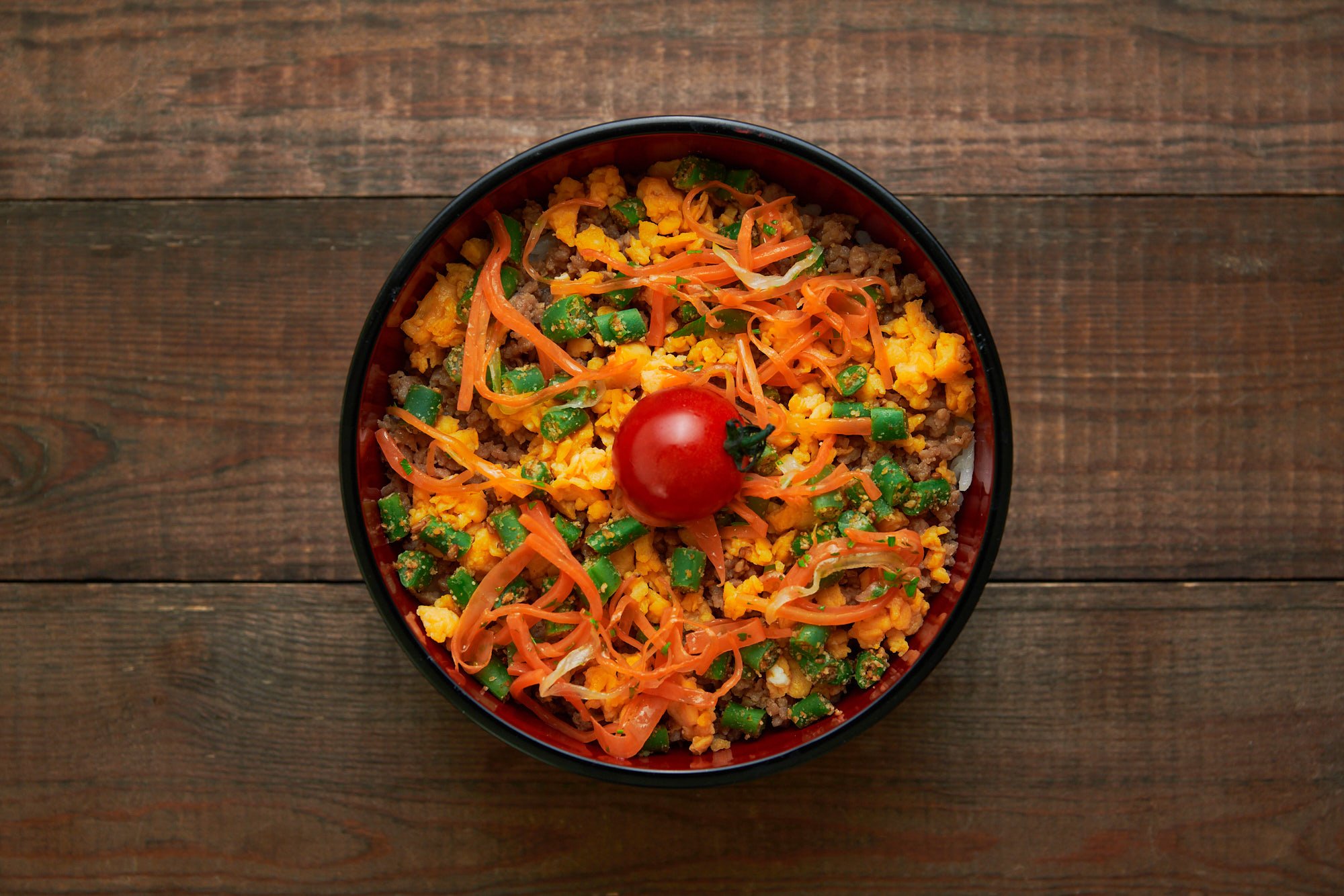 This colorful soboro donburi bento is an explosion of colors, tastes and textures in a portable lunch box.