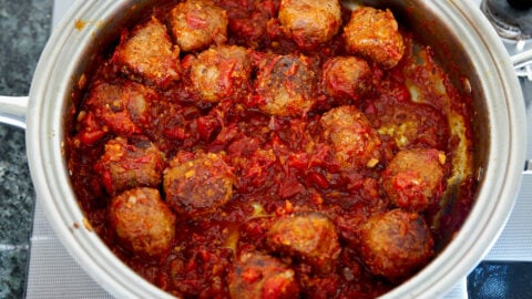 Simmer the meatballs together with the sauce until the sauce is thick and flavorful.