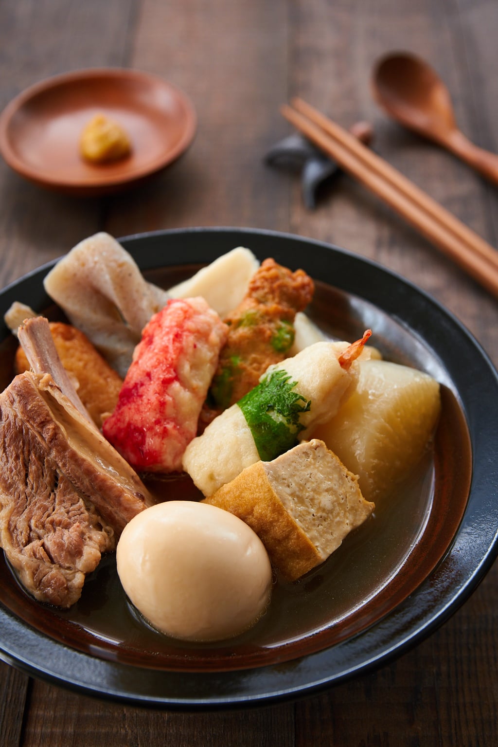 Oden is the quintessential Japanese comfort food. With meat, tofu, daikon, boiled eggs, and konnyaku simmered in dashi stock, it will warm you up from the inside out. 