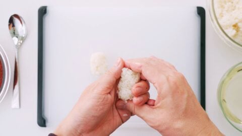 Shaping sushi rice for spicy tuna gunkan.